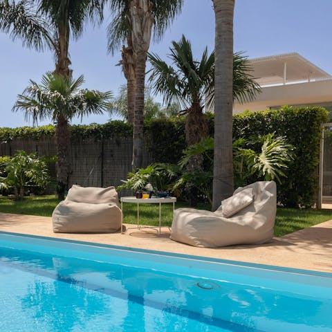 Lounge by the private pool
