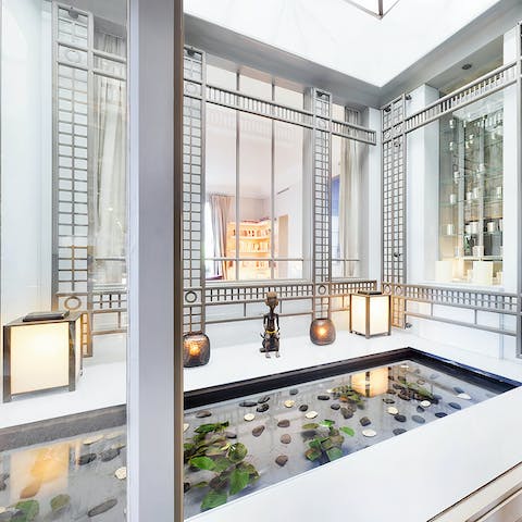 Sip Champagne by the ornamental pond – it's a soothing spot