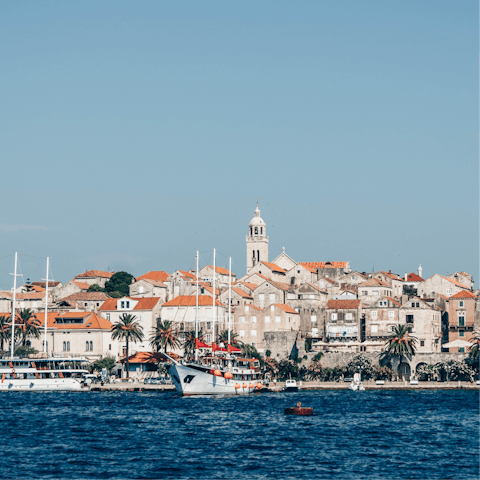 Stroll around the charming town of Korčula, a ten-minute drive away