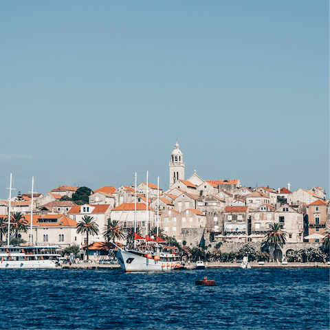 Stroll around the charming town of Korčula, a ten-minute drive away