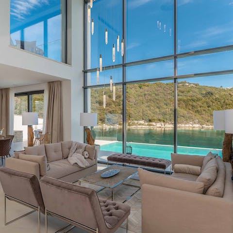 Watch the sun set over the crystal clear Adriatic Sea from your sophisticated living space
