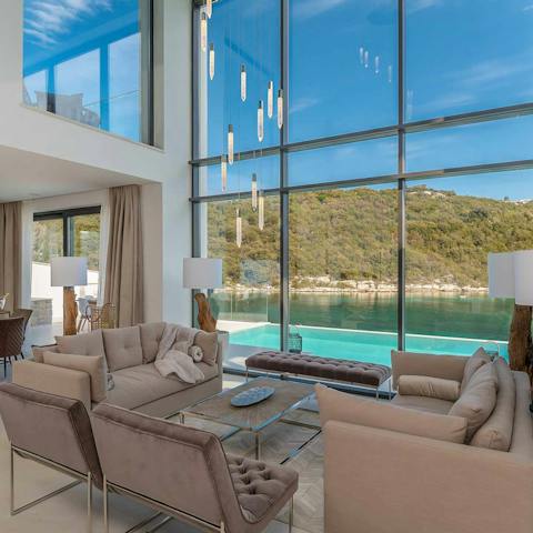 Watch the sun set over the crystal clear Adriatic Sea from your sophisticated living space