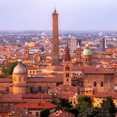 Visit Bologna for historic landmarks and excellent eateries