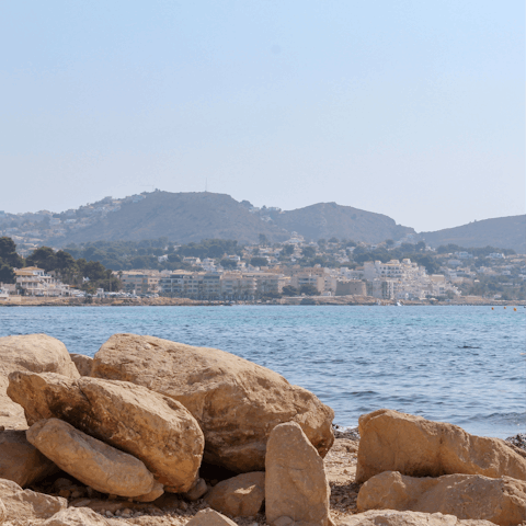 Visit the beautiful beaches of Moraira and pop into a beachside bar for a glass of sangria
