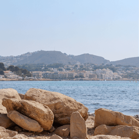 Visit the beautiful beaches of Moraira and pop into a beachside bar for a glass of sangria