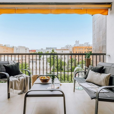 Relax with a glass of Cava on the balcony