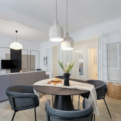 Plan your day over croissants and coffee at the dining table
