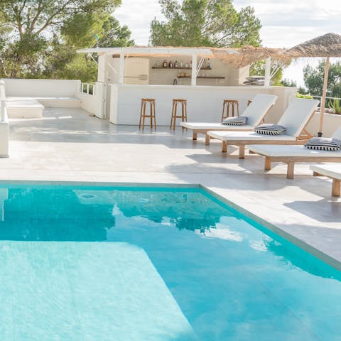 Get that Ibiza beach club feeling in poolside bar