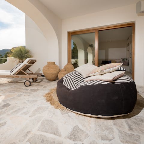 Sink into the bean bag with a good book on the terrace