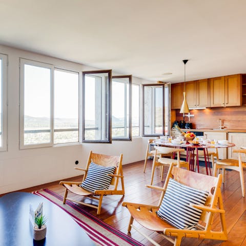 Relax and watch the world go by in the open living and dining area