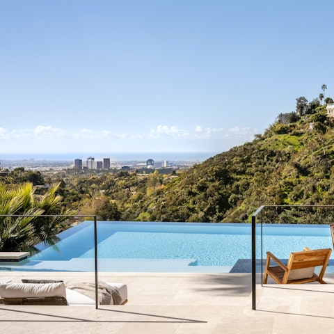 Stretch out poolside with sweeping views across Los Angeles