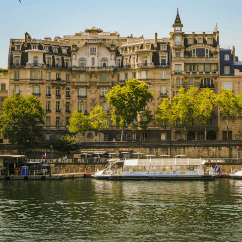 Embrace the timeless magic of Paris while strolling by the Seine