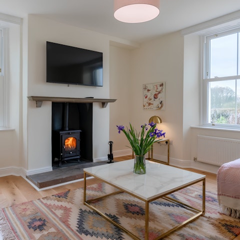 Get cosy by the fire after a day of exploring