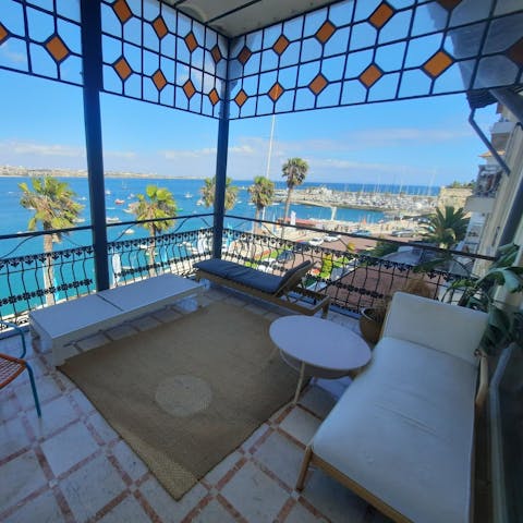 Enjoy a glass of Vinho Verde on the sea-facing balcony