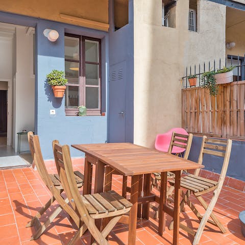 Share a bottle of Priorat on the sun-soaked terrace