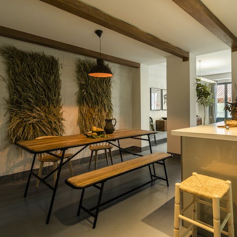 Sit down to a celebratory meal beneath the dining area's beams