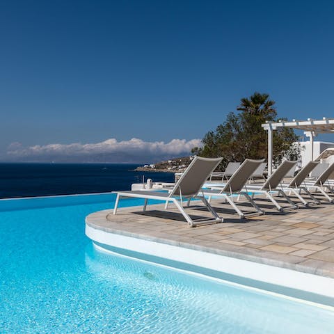 Spend endless sunny days lounging by the pool