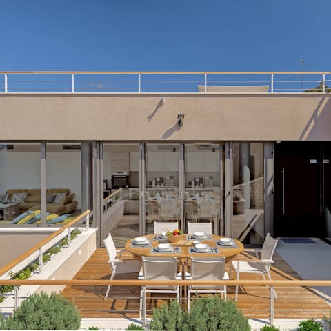 Enjoy your Aperol in the sunny sea breeze