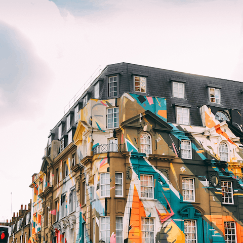 Admire the street art of Shoreditch as you walk to a cafe for lunch