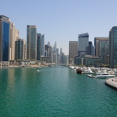 Marvel at the majesty of the Dubai marina, an approximately 40 minute drive away
