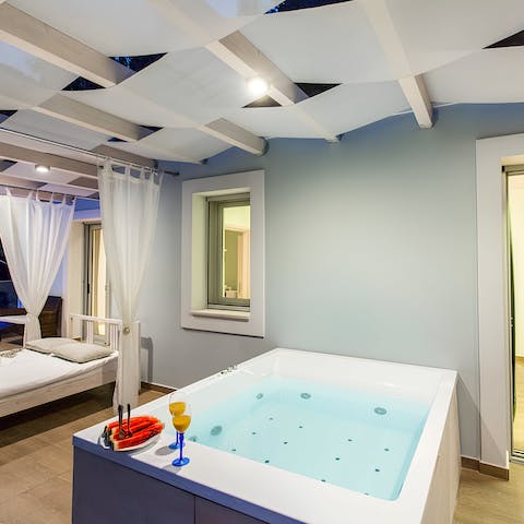 Relax in the hot tub after a day exploring the Corfu coast
