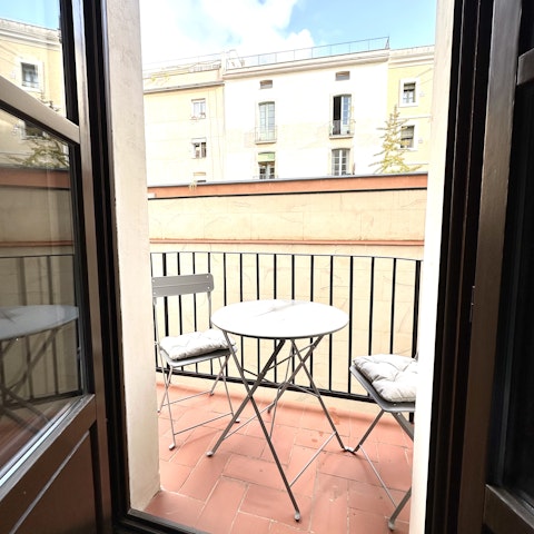 Sip an alfresco coffee on the private balcony