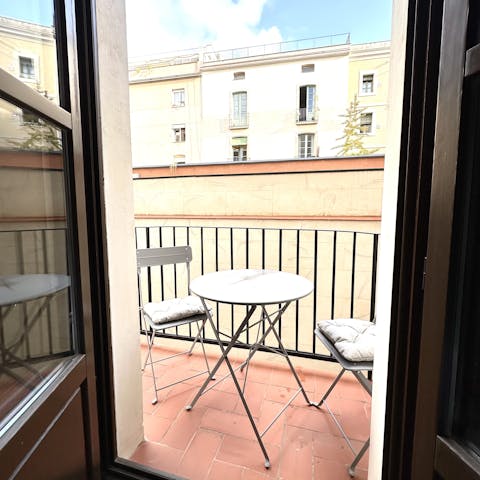 Sip an alfresco coffee on the private balcony