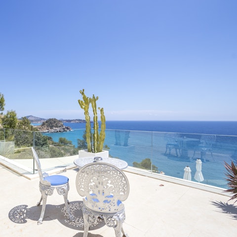 Crack open a bottle of wine as you drink in the sea views