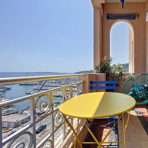 Sip croissants and coffee on the balcony with a view of the harbour