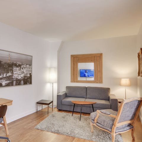 Enjoy a glass of Champagne in the living room
