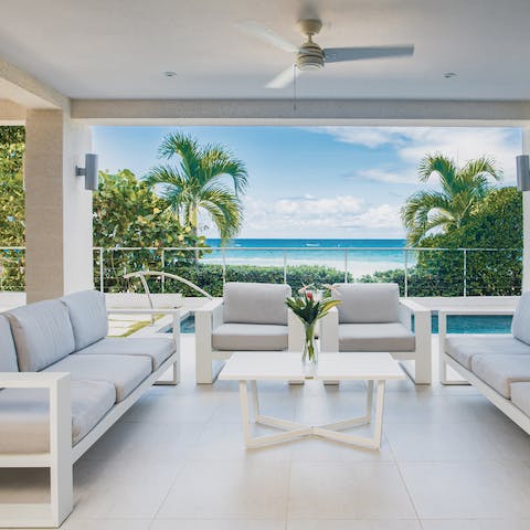 Sit out on the terrace lounge and listen to the waves