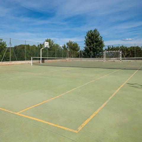 Show off your powerful serve on the villa's very own tennis court