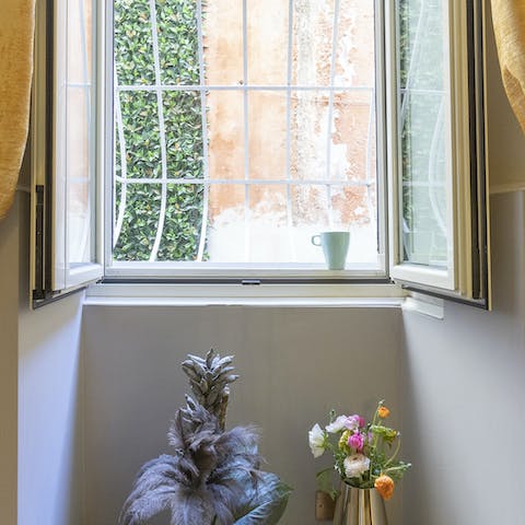 Peep into the Church of Sant'Agata's courtyard from your bedroom window