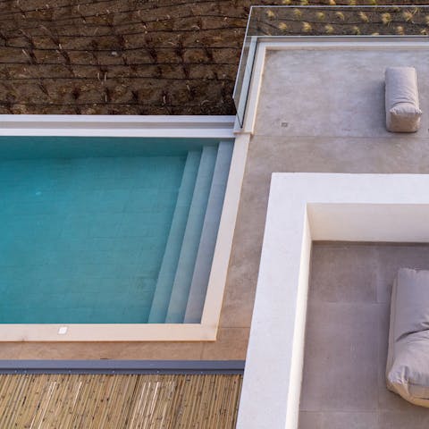 Make morning swims in the shared infinity pool the new routine
