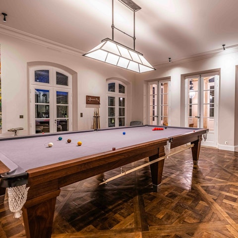 Entertain guests in the games rooms