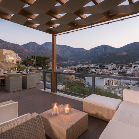 Take in picturesque views over the bay with a cocktail in hand