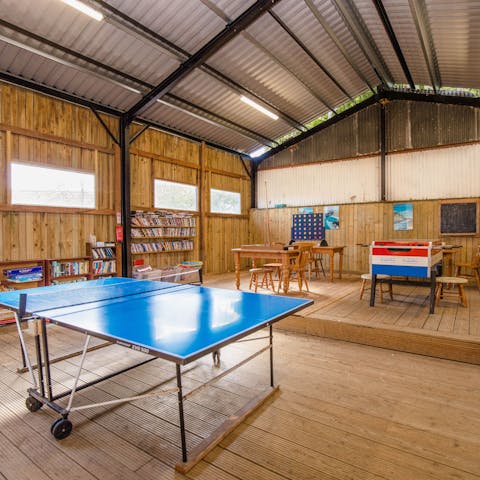 Challenge your loved ones to a game of ping pong or foosball in the communal games room