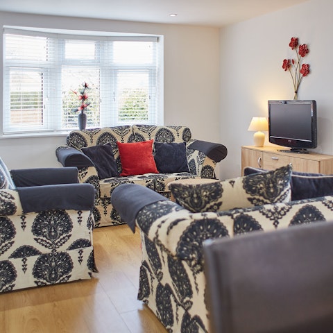 Settle down on the sumptuous sofas for a movie night after a day exploring