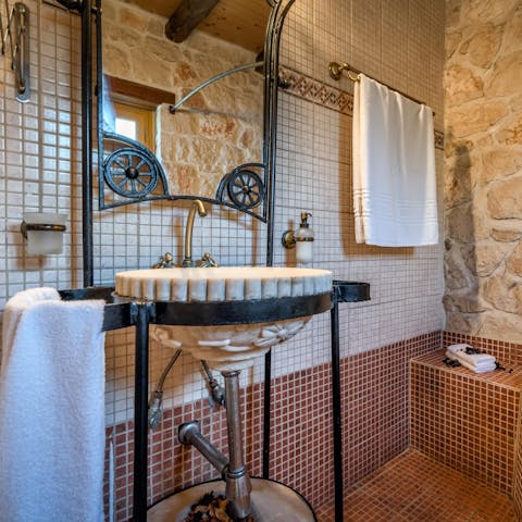 Enjoy quirky design touches like the steam-punk-esque sink