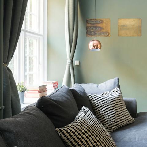 Relax after a busy day on the cushy sofa – the Apple TV has Netflix if you're in the mood to watch a movie