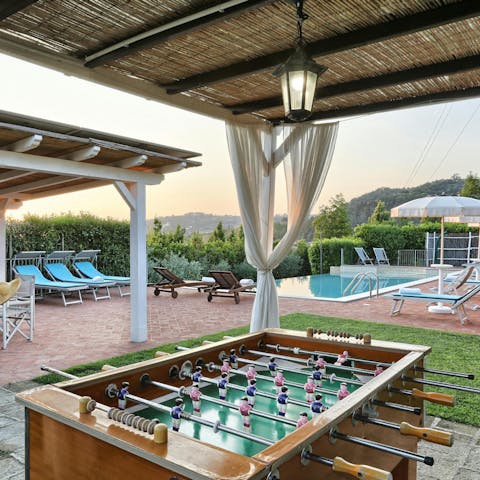 Play a few games of foosball under the shade of the cabana