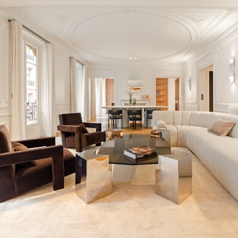 Relax in the elegant living room with a glass of Champagne