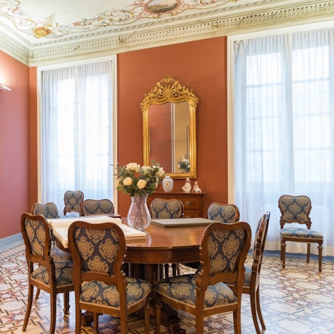 Dine beneath the frescoed ceilings