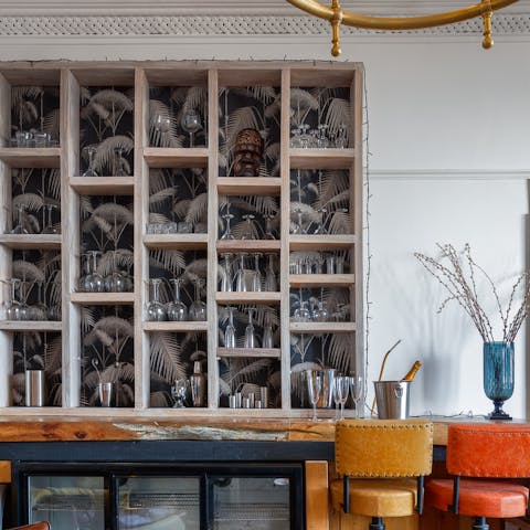 Have a cocktail party at the expansive bar area