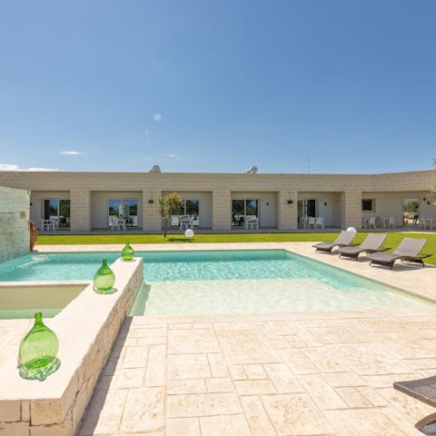Lounge next to the outdoor pool, shared with the neighbouring residents