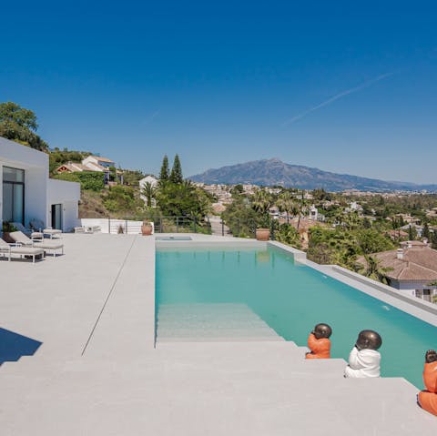Enjoy fabulous views across the coast whilst swimming in the pool