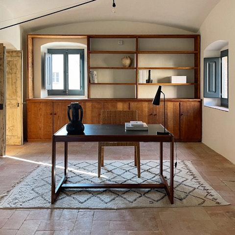 Set you laptop and work remotely at the desk if you're mixing business with pleasure