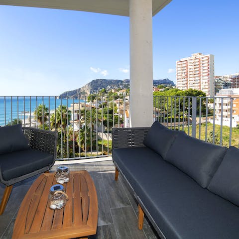 Relax with a glass of wine on the terrace after the kids have gone to bed