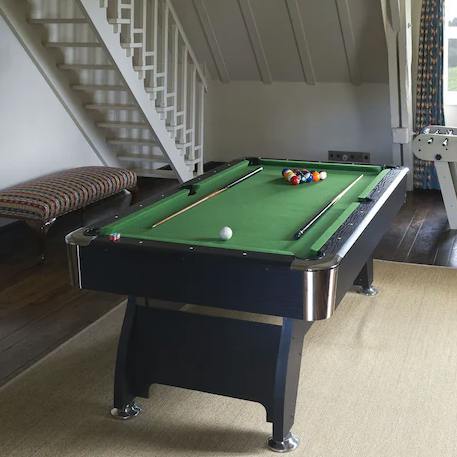 Get competitive over a round of billiards in the games room