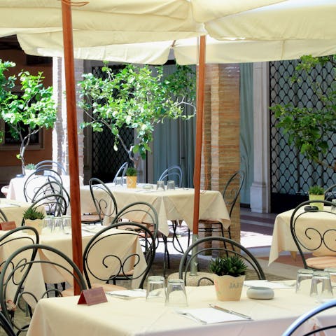 Dine like a local in your building's courtyard restaurant